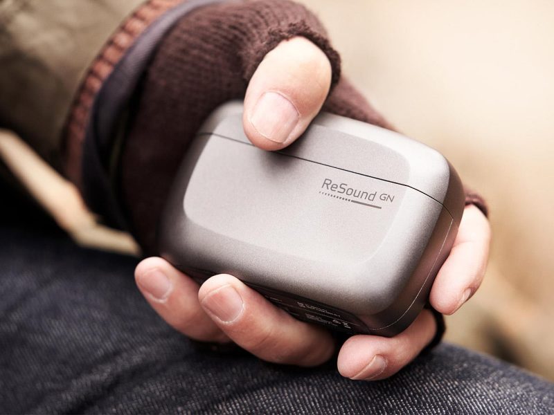 man_holding_rechargeable man_holding_rechargeable